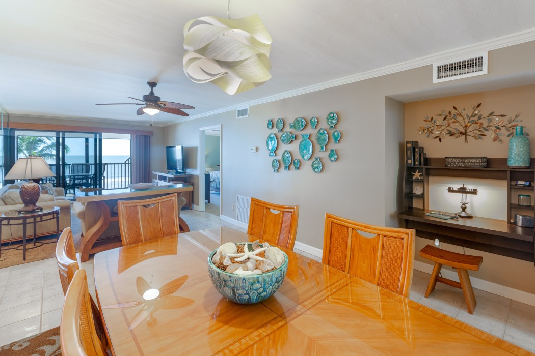 View from Dining Room Looking to Family Room, Lanai, and Beach