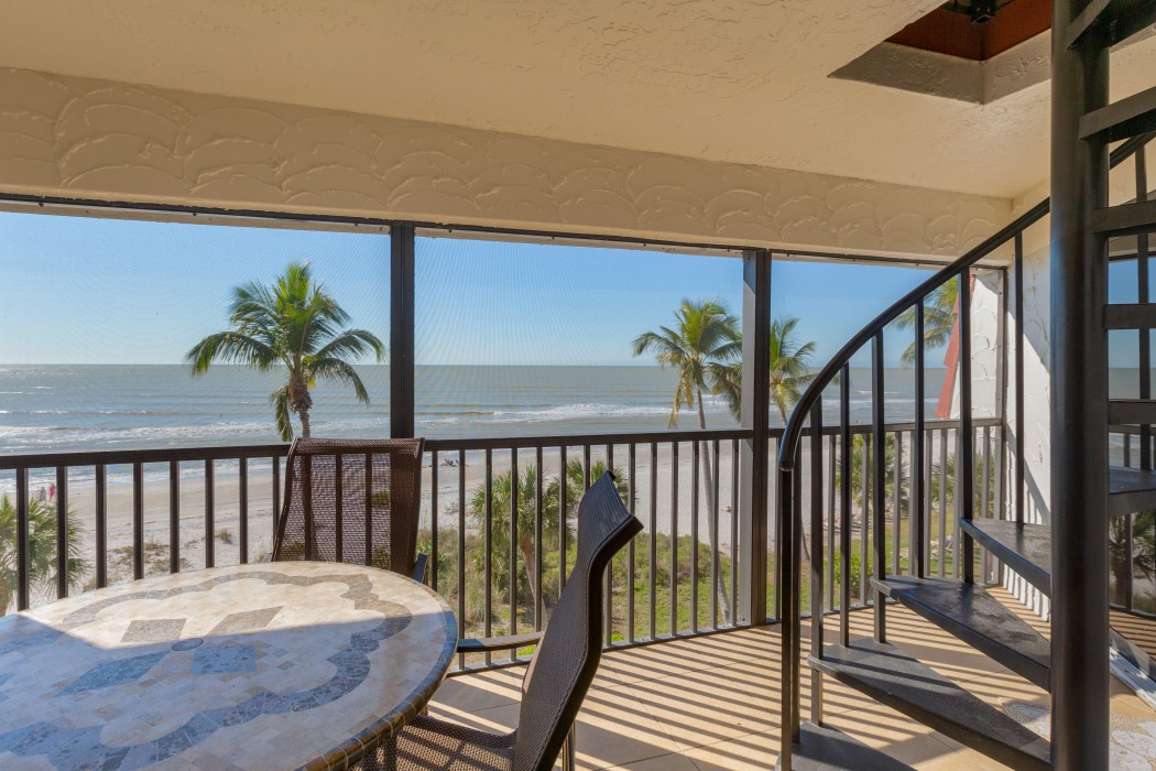 Lanai View looking to Beach and staircase to Roof Top Deck