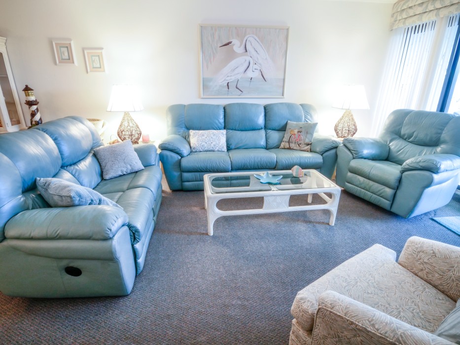 Comfortable spacious seating in the reclining sofas in Living room.