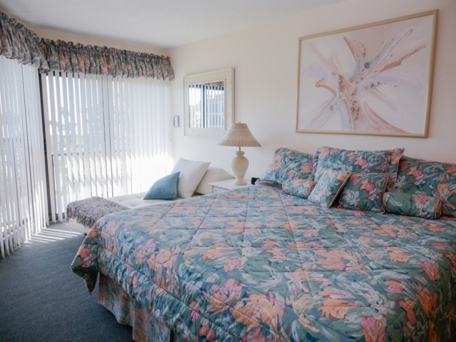 King bed  in Master Bedroom and Chaise lounge.