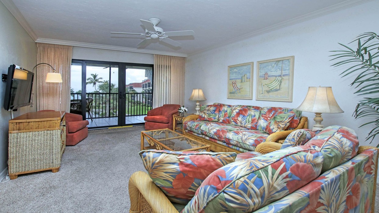 Ceiling fans in the living room and bedrooms allow guests to move the air inside when opening the condo sliders to the evening Gulf breezes.