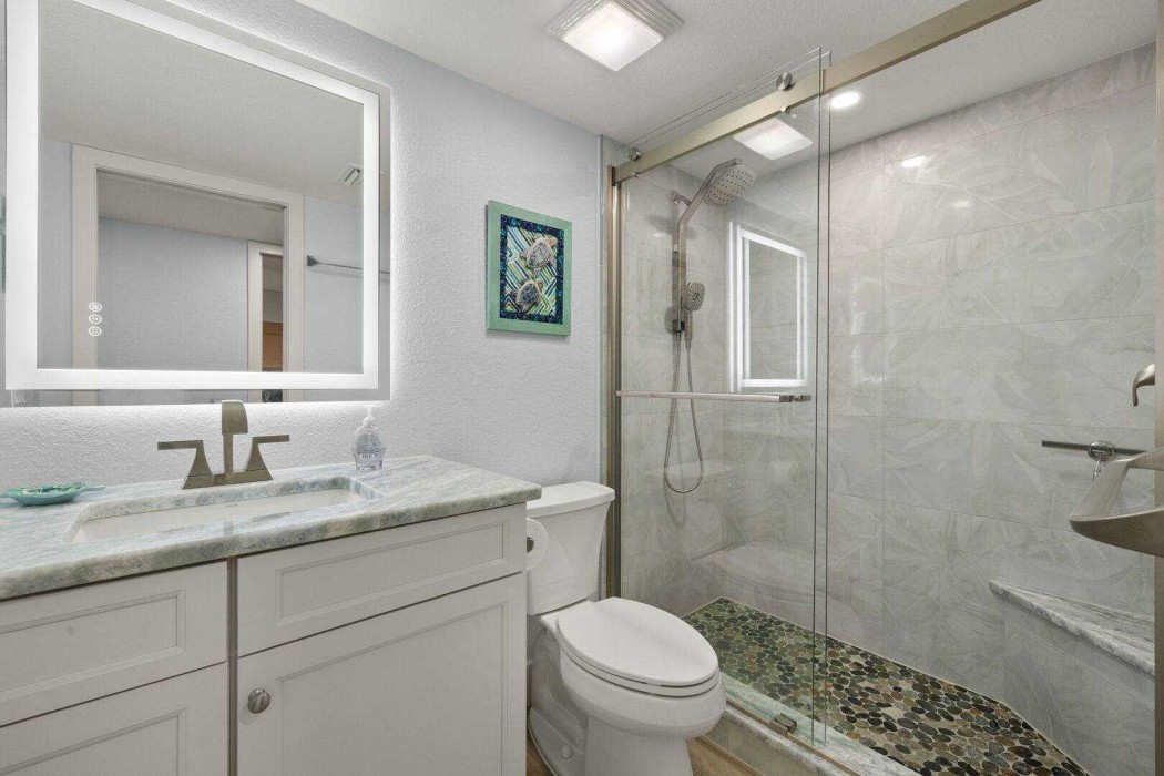 Guest Bathroom with a large step in shower.