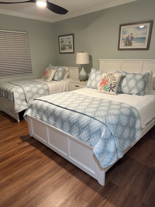 Comfortable queen and twin beds in the guest room, with direct access to bath. Includes smart TV