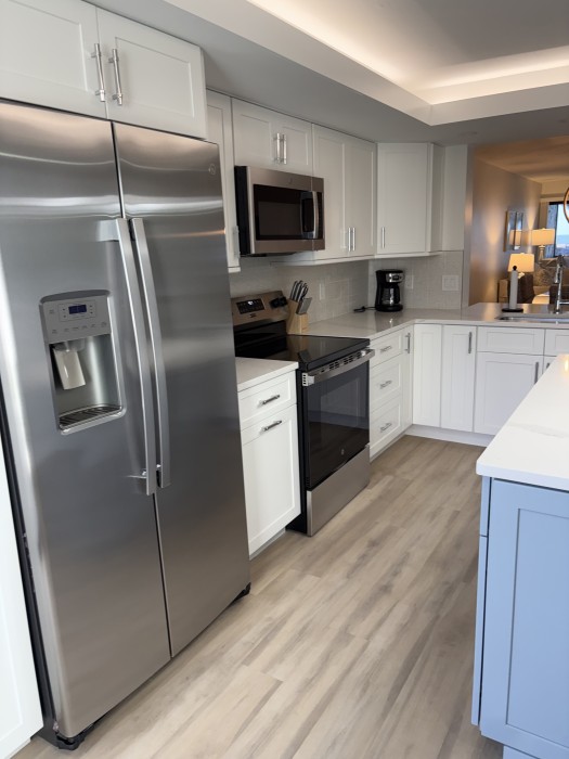 Kitchen - We even have plastic champagne and wine glasses to toast the sunsets on the beach!