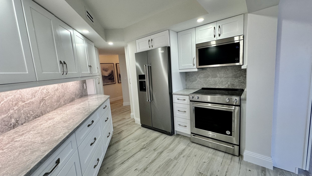 The spacious kitchen makes meal prep and entertaining a breeze.