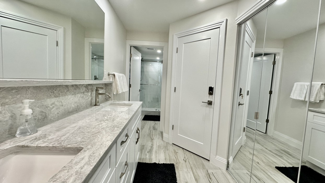 The Primary bath features oversized dual vanities, spacious closets, separate shower/water closet.