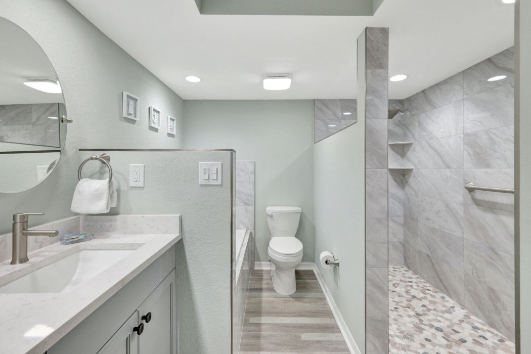 Master bath includes a shower and bathtub