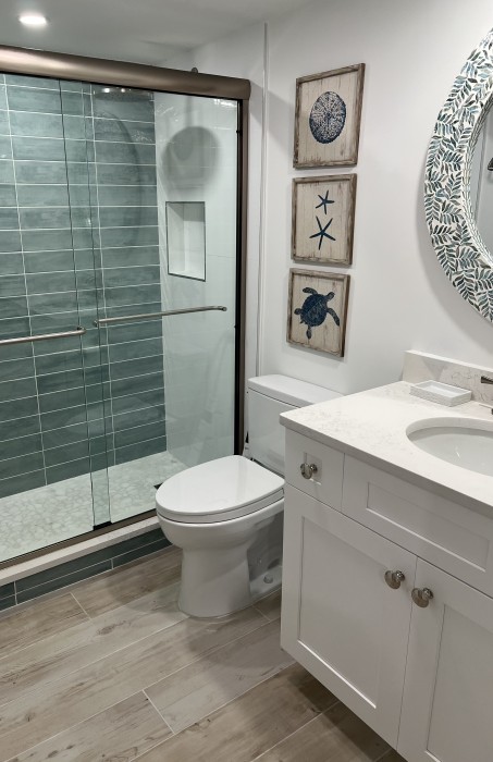 Guest bathroom with walk in tiled shower