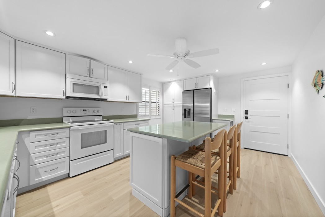 New kitchen with extra seating and fully equipped for family cooking