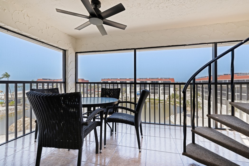 Enjoy the breeze on the screened lanai with gulf views