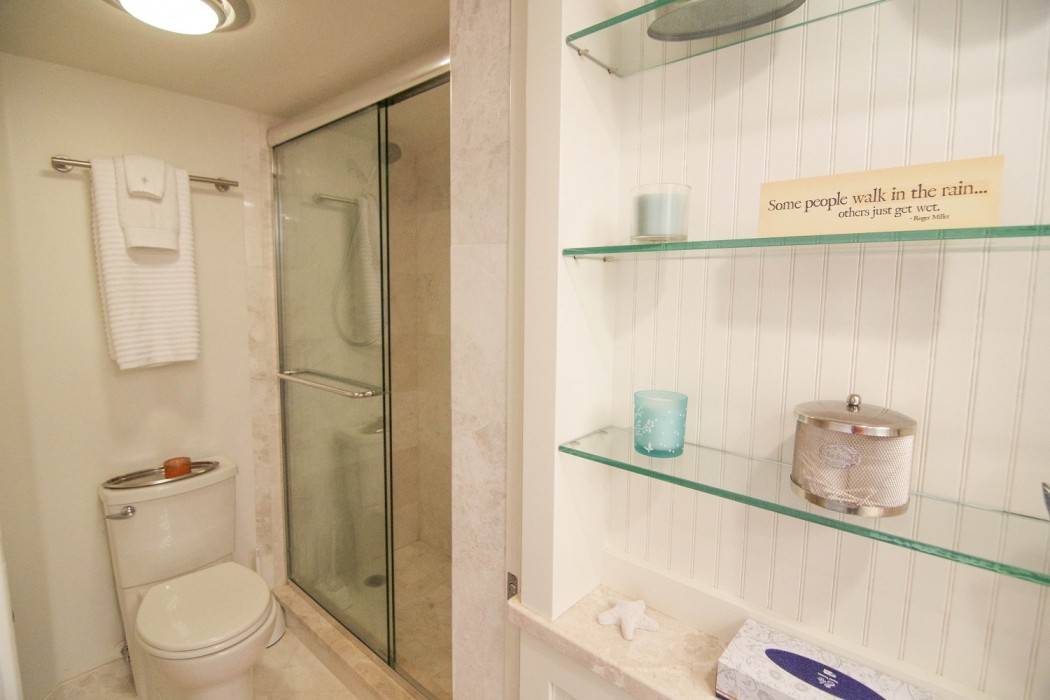 Pocket door separates the shower area from the vanity