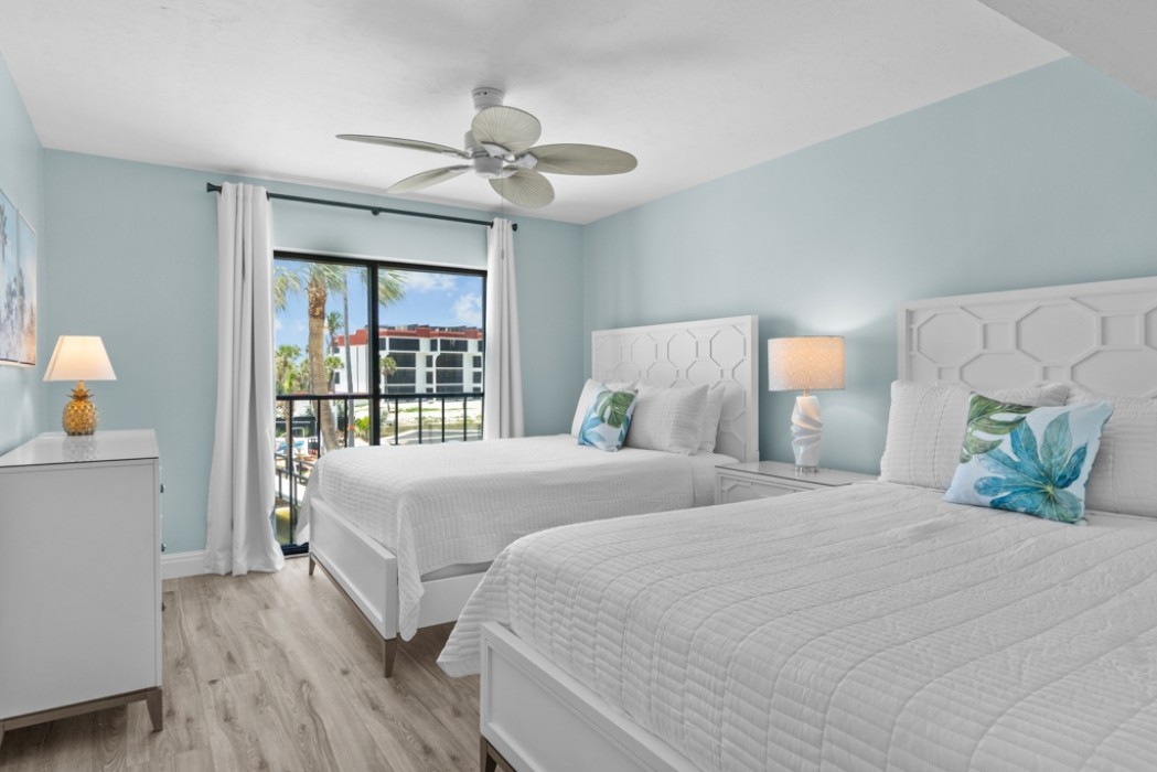 Guest Bedroom offers two queen size beds and full, direct Gulf views