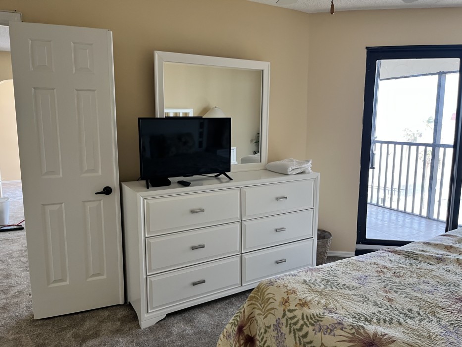 Master Bedroom with king size bed and flat screen TV
