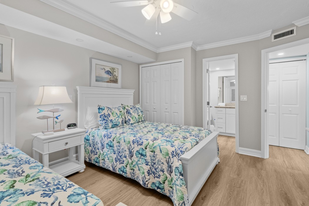 Guest bedroom with entry door to bathroom