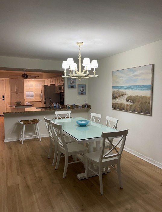 Enjoy meals in the dining room, or pull up a stool at the island or peninsula of our fully stocked kitchen.