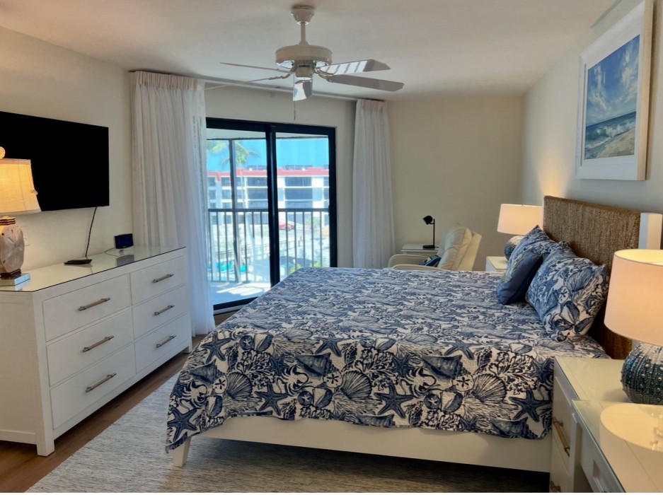 Wake to views of the Gulf from the king sized bed in the main bedroom with smart tv; desk with leather chair included.