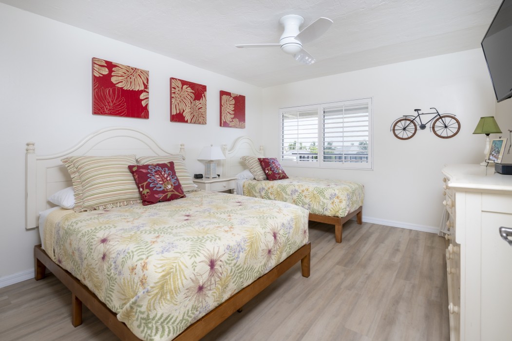 The guest bedroom has new queen and extra long twin beds. Also plenty of storage