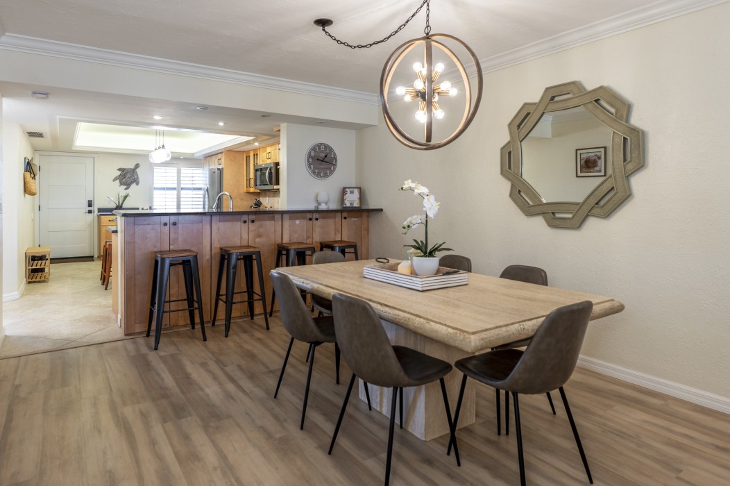 The counter seating is perfect for that afternoon snack. The cabinets hold books,  puzzles and games.