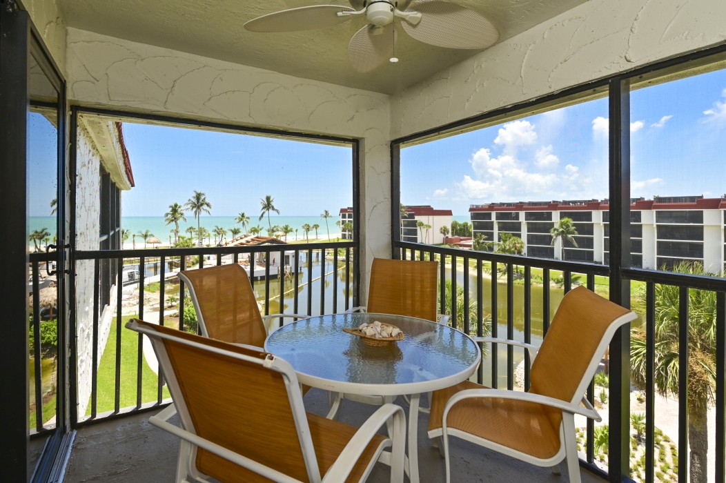 Enjoy the view of the Gulf and lagoon from the enclosed lanai.