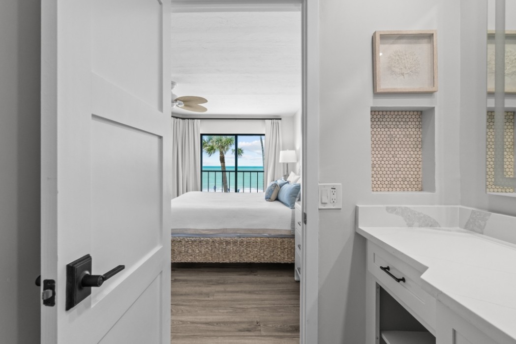 Master Bathroom features a walk-in closet with custom closet organizers