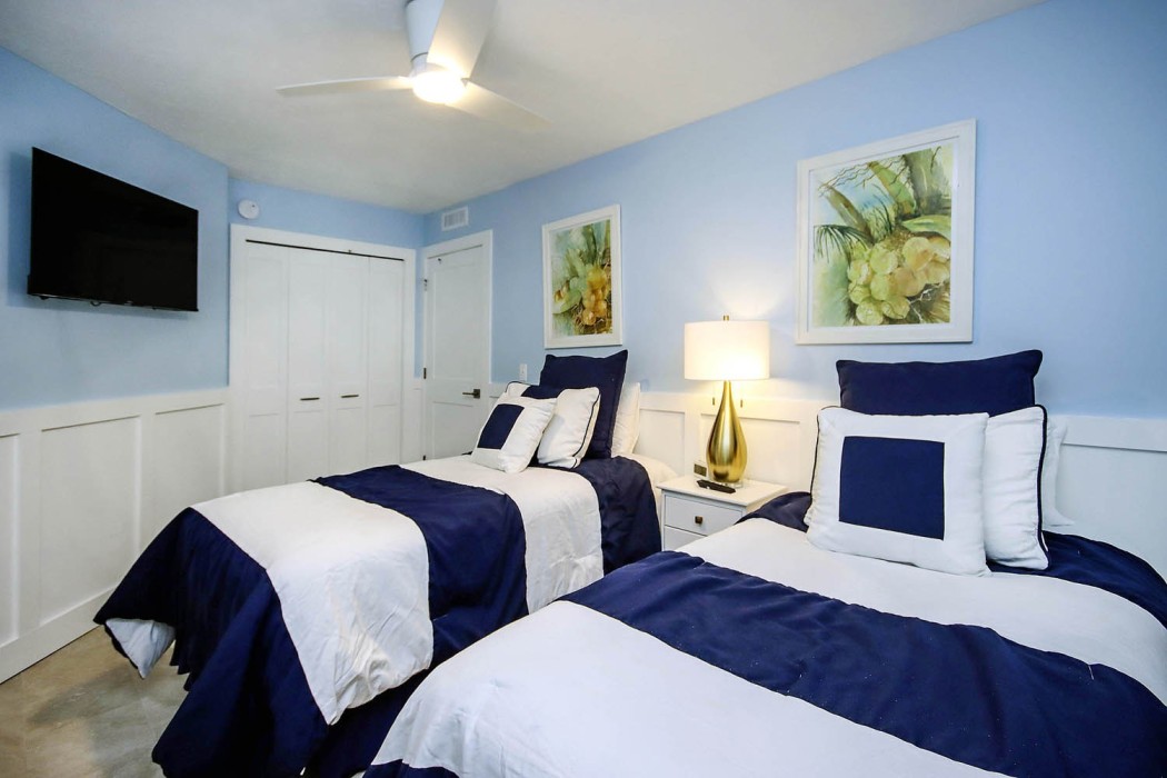 The third bedroom features 2 twin beds