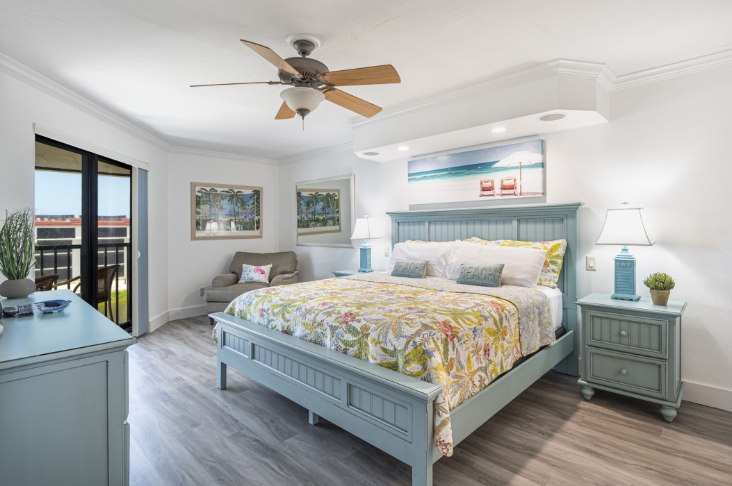 Master bedroom professionally decorated with tropical furniture