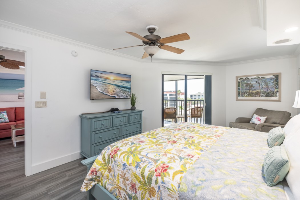 You can watch TV on the flat screen in the master bedroom