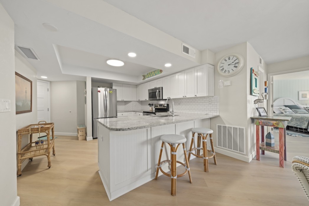 Kitchen counter with bar stools