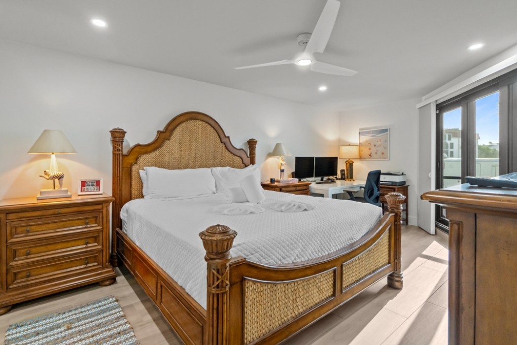 Master bedroom w/king bed and a desk