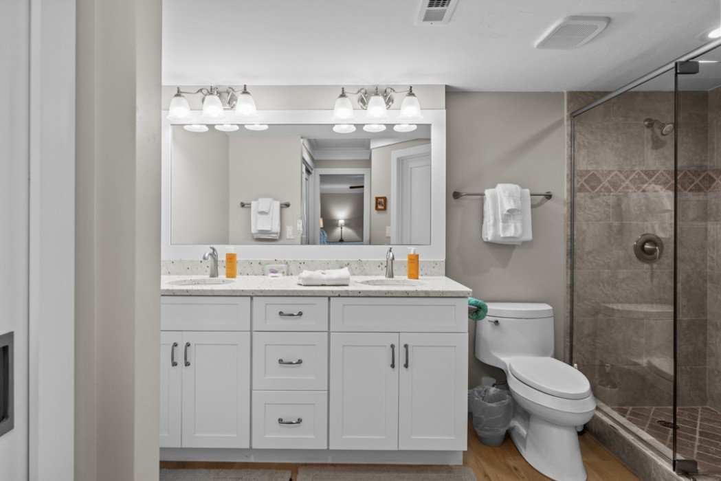 Master bathroom with walk-in shower and double vanity