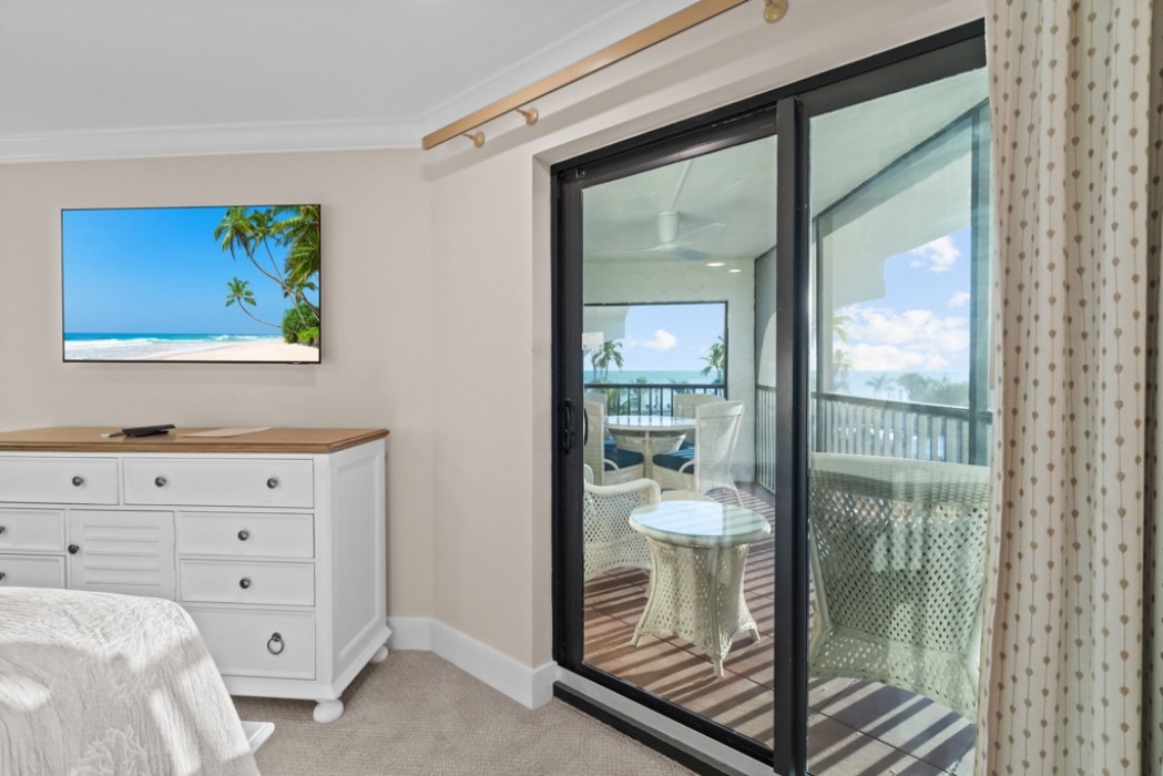 KING BEDROOM WITH LAGOON AND GULF VIEWS